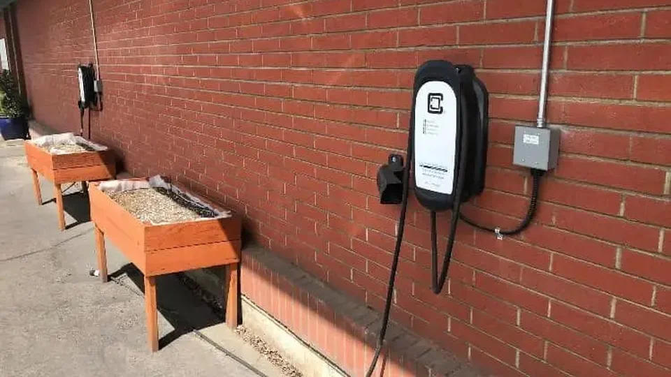 Spokane licensed electrician mounting code-compliant Level 2 EV charger conduit